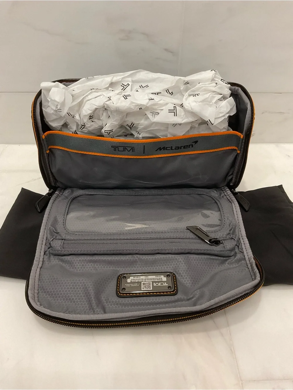 NWOT Tumi McLaren REMEX 10.0” x 5.25” Accessory Kit Bag - BLACK & PAPAYA ORANGE